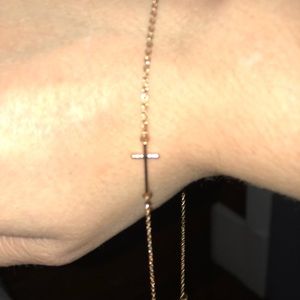 Cross choker necklace.